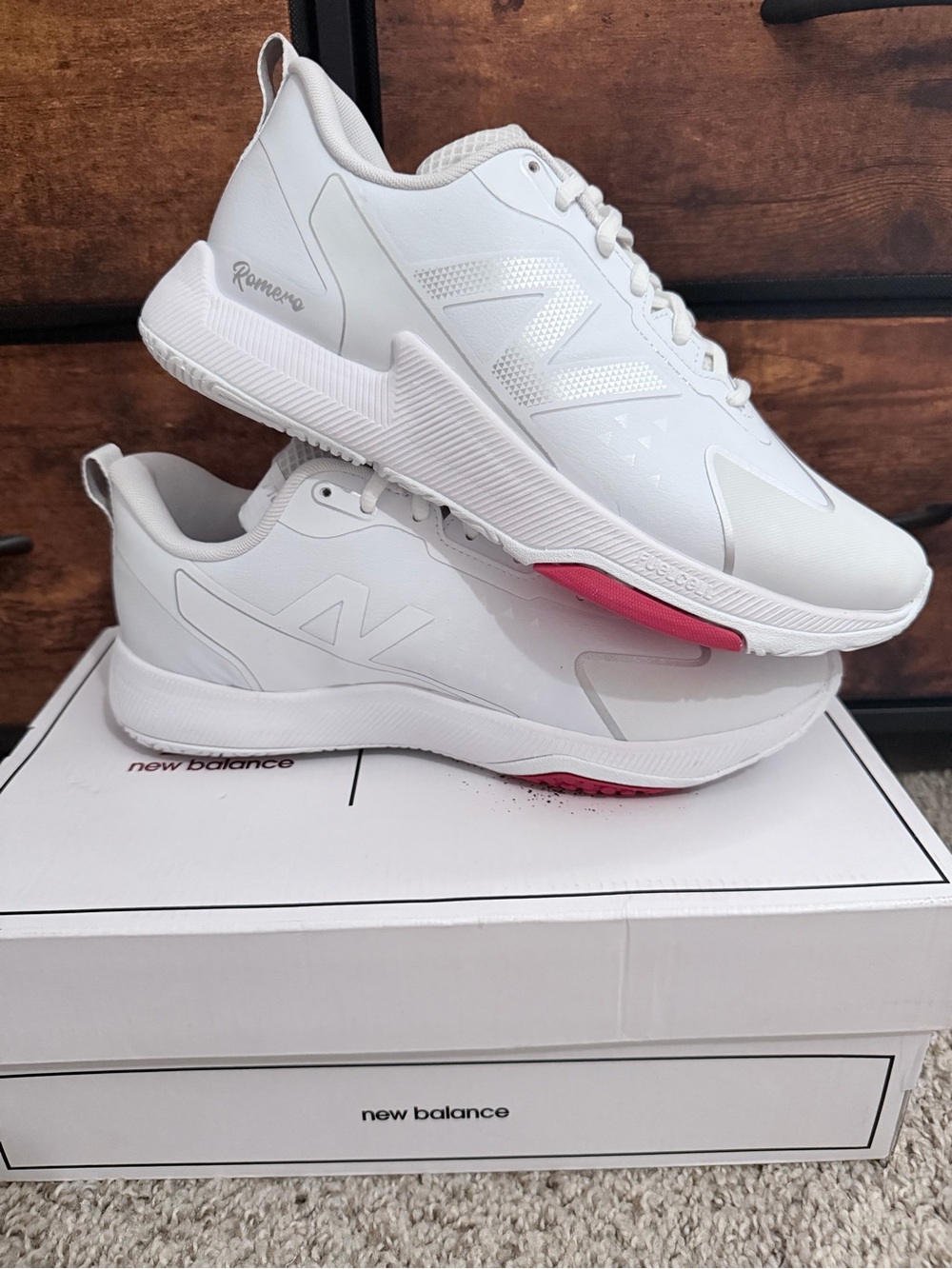 New Balance White Athletic Sneakers with Pink Sole Accent
